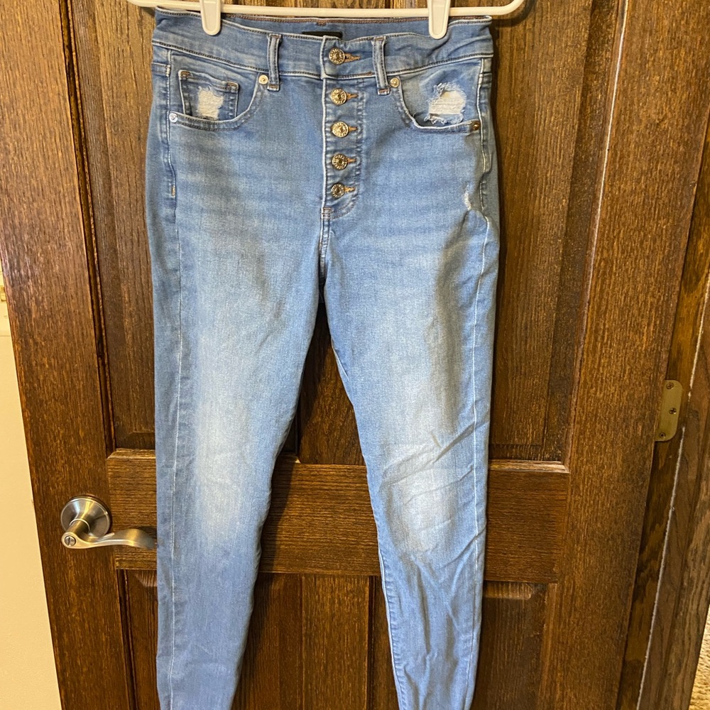 EUC Express distressed button up skinny jeans